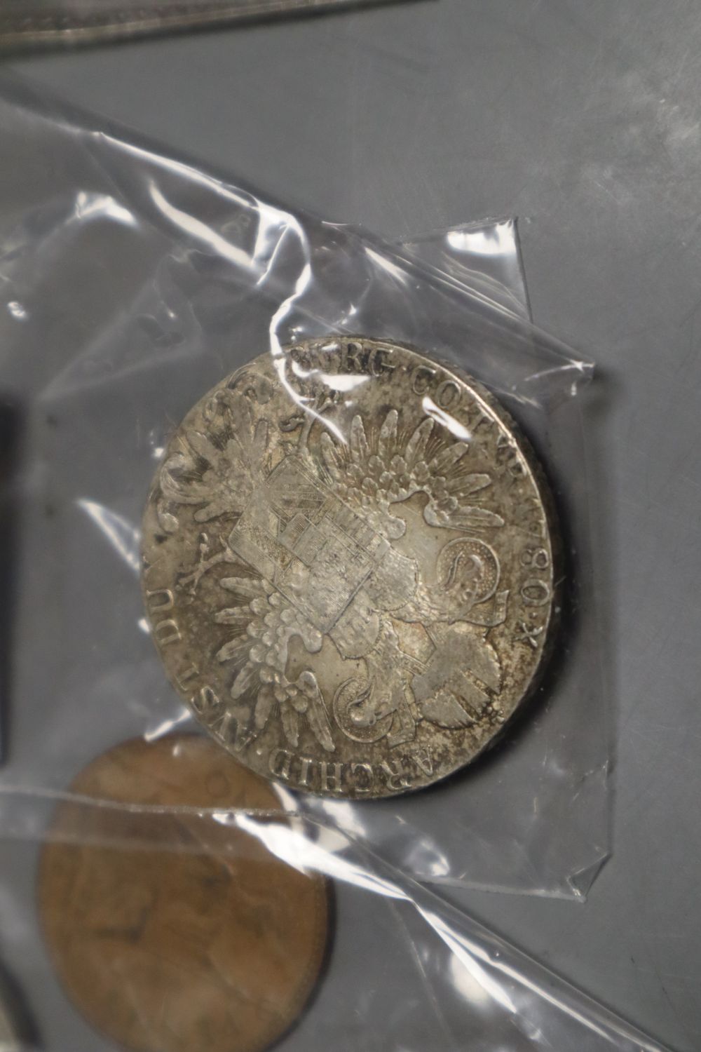 A small collection of coins, including a Tibet, Guang Xu, Szechuan, Rupee, 1902-11,